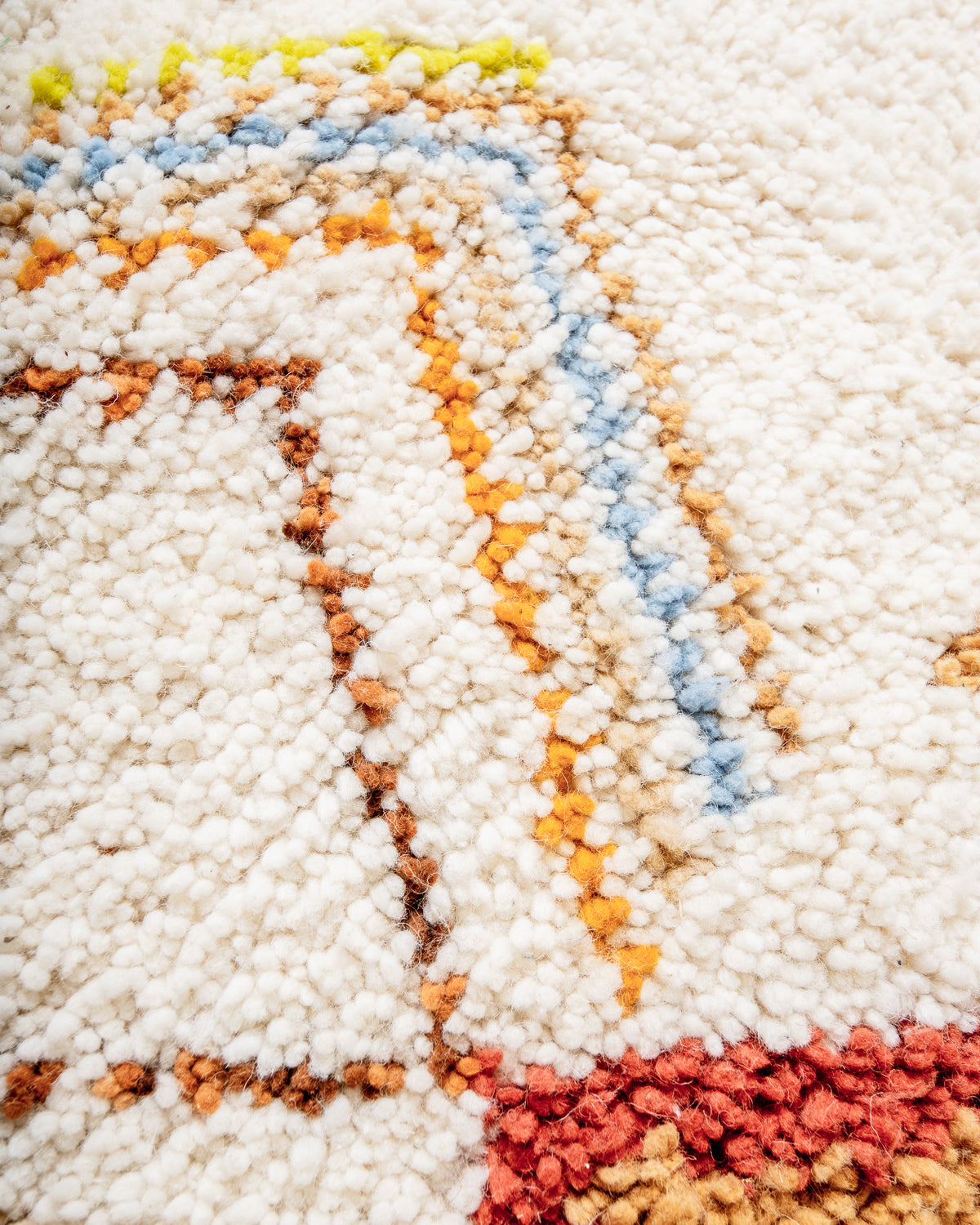 Modern, designer, handcrafted Berber rug from Morocco. Beniourain carpet with beautiful colours and patterns and fluffy wool texture.